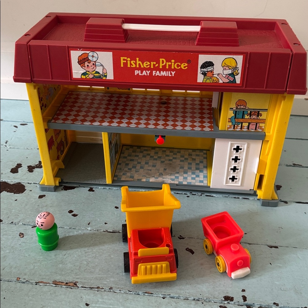 Vintage 1976 Fisher-Price Play Family Hospital with a few extras.